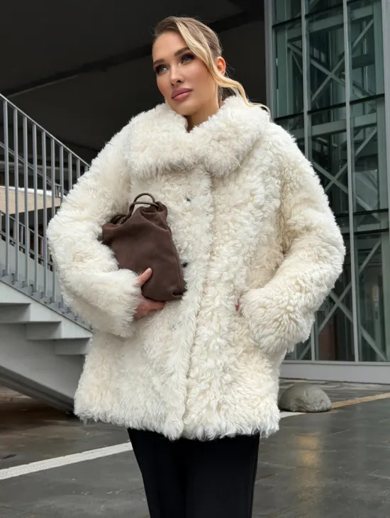 Белая шубка из тиградо - фото 10